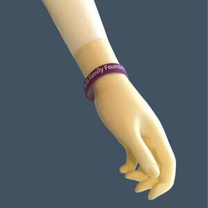 BEAUTIFUL "WISHING WELLS TOY DRIVE" PURPLE BRACELET